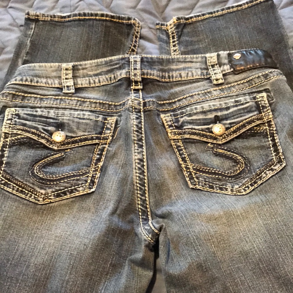 Gently worn silver boot cut jeans